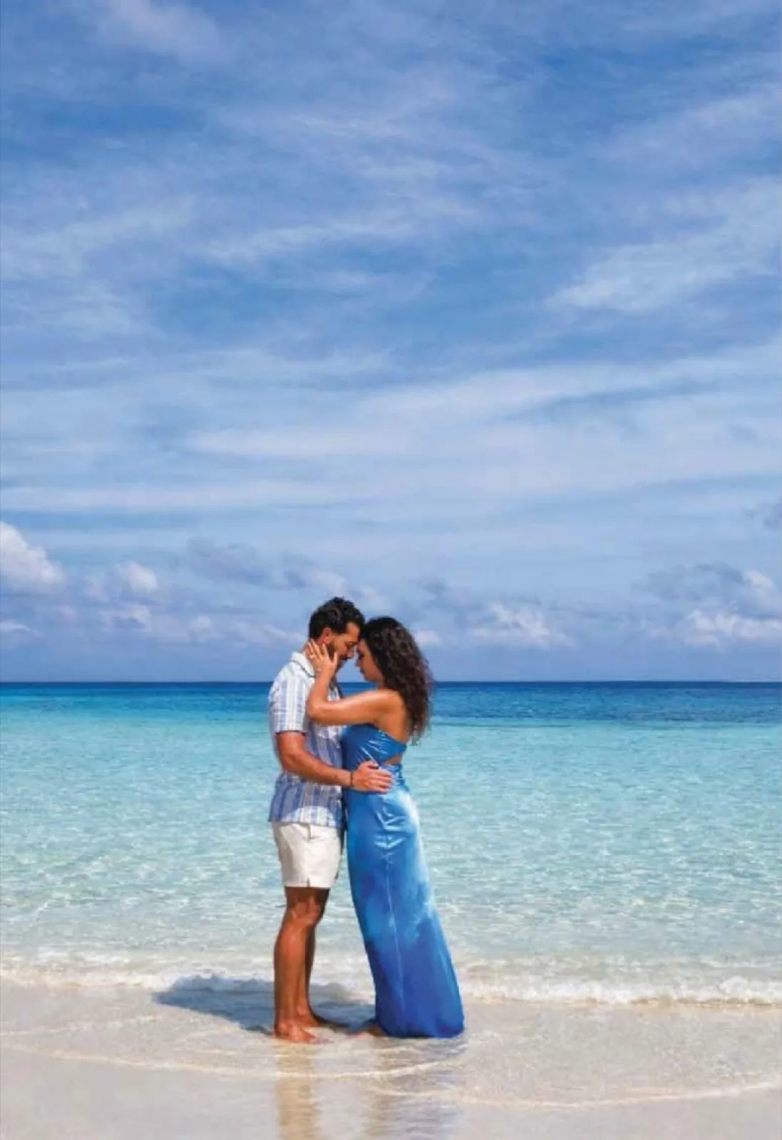 Couple on the beach during their honeymoon at Be Zanzibar