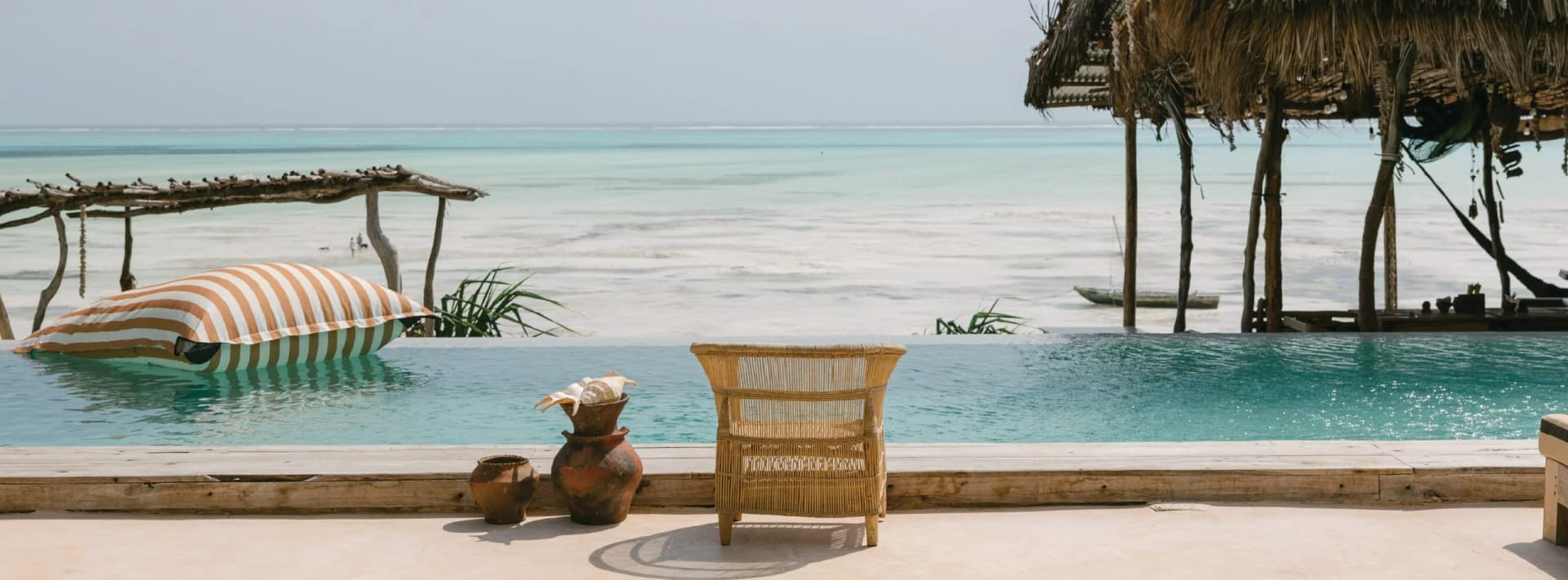 Be Zanzibar contact - pool and beach at dusk