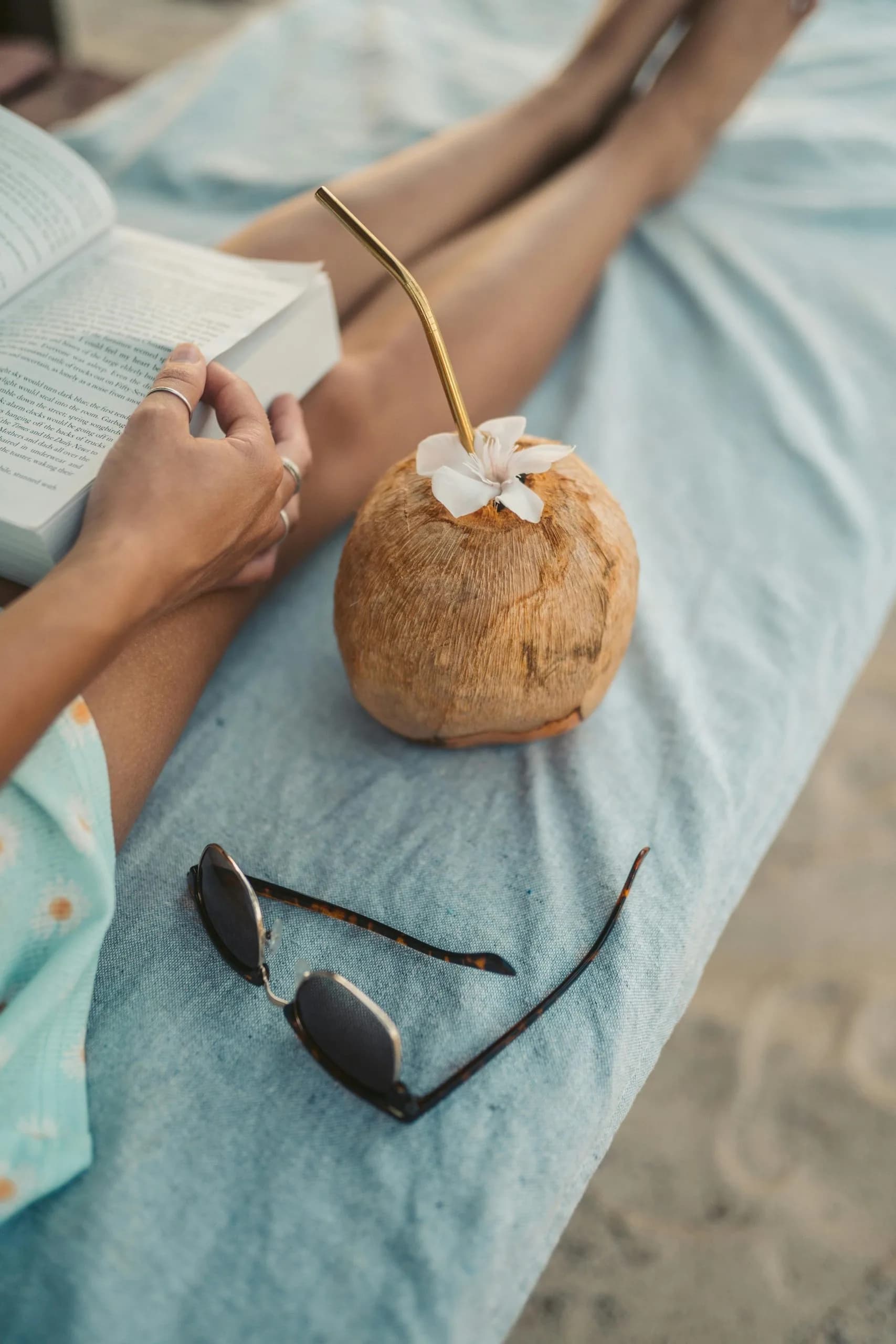 Relaxing at Casa Coco with a coconut drink and a book